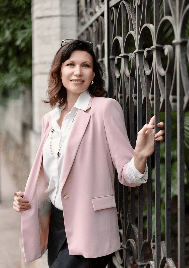 Olga Volkova in a soft pink blazer